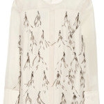 De organza de seda com cristais e plumas By Malene Birger, €420.