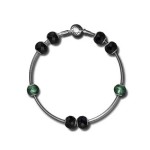 Pulseira com as pedras Strength e Prosperity.