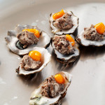O almoço Silver Spoon: peixe com gema de ovo servido em ostras.