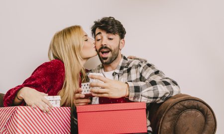 gifting-concept-with-girl-kissing-boyfriends