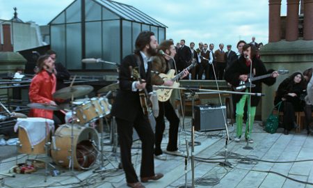 Ringo Starr, Paul McCartney, John Lennon, and George Harrison in THE BEATLES: GET BACK. Photo courtesy of