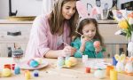 little-girl-with-mother-painting-eggs-easter