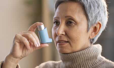 senior-woman-holding-asthma-inhaler